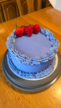 2 layer vanilla cake filled with fresh strawberries
