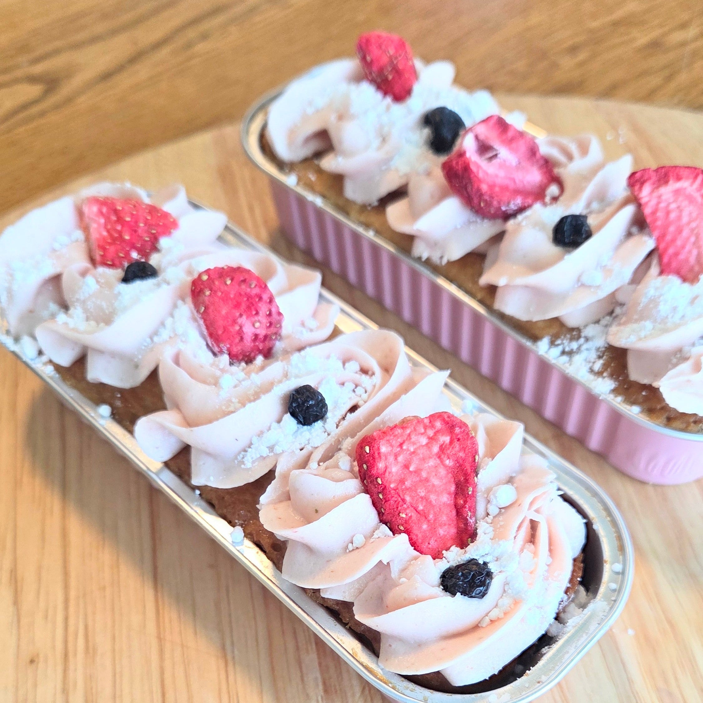 Mini Berry loaf topped with a light vanilla buttercream